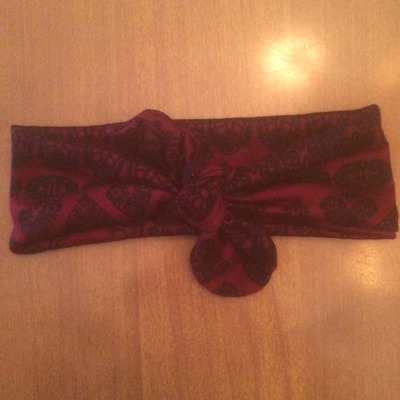 Maroon and black tie knot