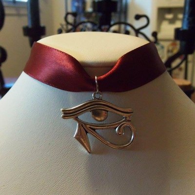 Silky ribbon choker with eye of horus charm