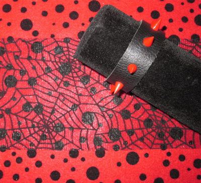 Black Leather Bracelet with Red Spikes