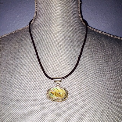 Leather cord with tiger statement pendant