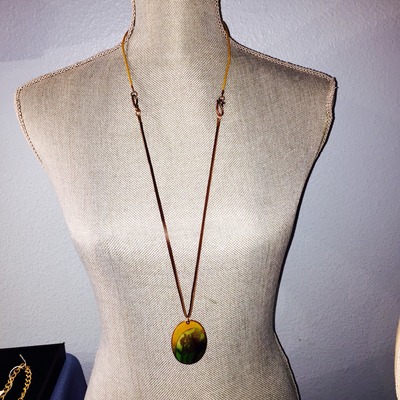 Unique flower pendant with long and short chain