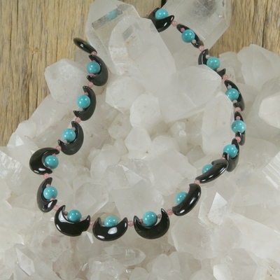 Turquoise, rhodochrosite and onyx half moon necklace