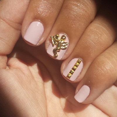 Gold cupid/angel charm