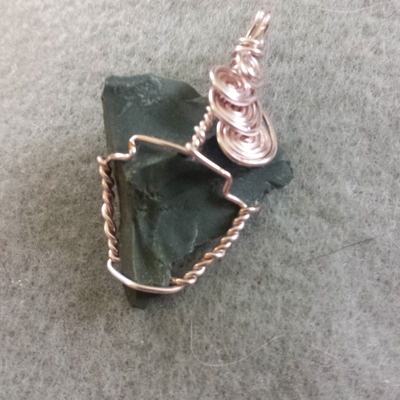 Wire wrapped stone arrowhead pendant