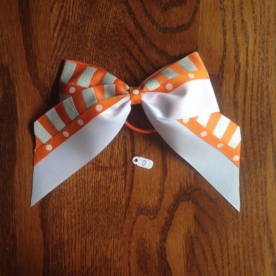 Glitter white with orange stripes and dots