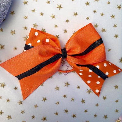 Glitter orange and orange dots with glitter black