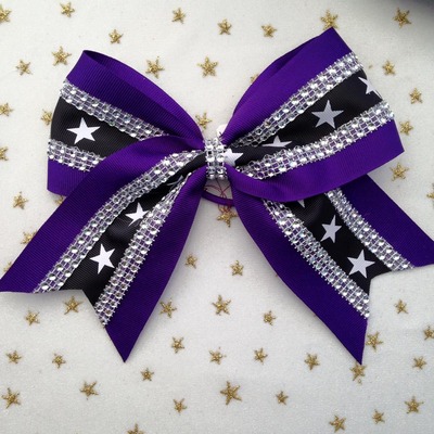 Purple with black/white stars and rhinestones