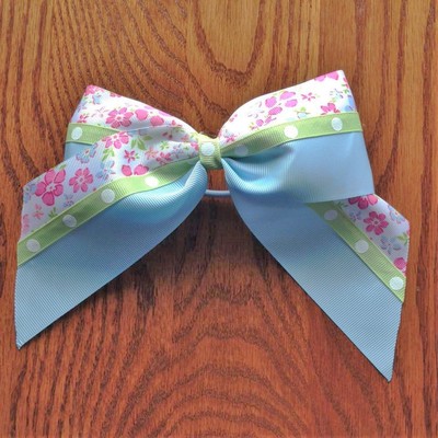 Light blue, pink and blue flowers, and green dots