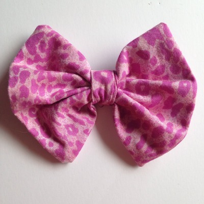 Pink cheetah fabric bow
