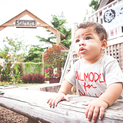 Will model for milk onesie - infant