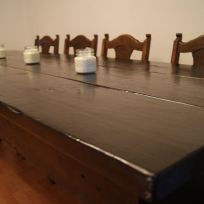 Hand made custom table .  ebony stain with clear coat.  benches available.  big solid table.  great work station as well