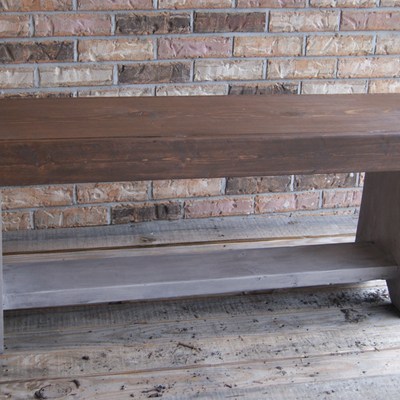 Rustic bench.  stained top, primitive legs.  shabby chic finish.  has shelf for storage.
