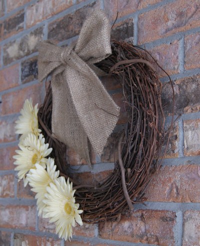 Wood wreath, yellow floral.  sewn burlap bow.  handmade