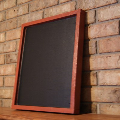 Chalkboard with rustic red frame.  solid wood chalkboard.  fired brick with glaze.