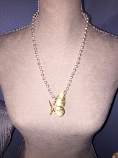 Pearls with butterfly pendant