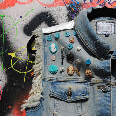 Cameo & leather vest