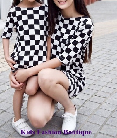 Mother daughter matching black & white dresses