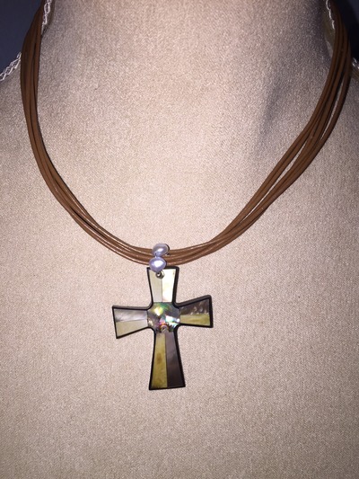 Tan cord chain with Shell Cross