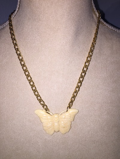 Butterfly pendant on gold chain