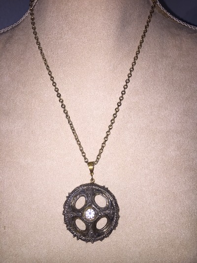 Bold Circle Pendant with Sparkle in center