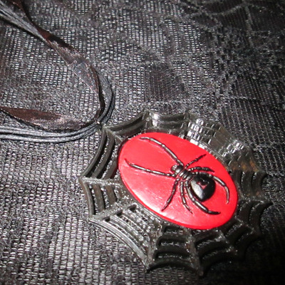 Black widow spider web necklace in red and black 