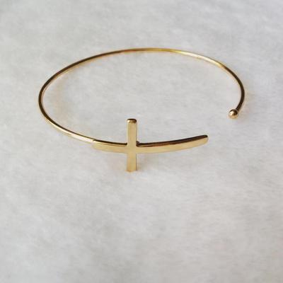Cross gold bangle bracelet