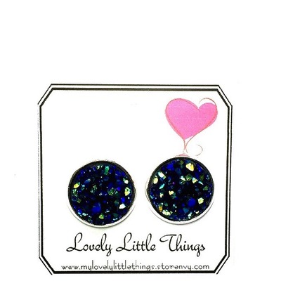 12mm midnight blue/green studs with silver setting 