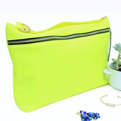 Neon zipped clutch
