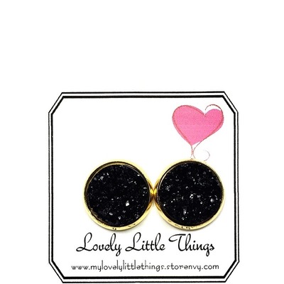 12mm black studs with gold setting 