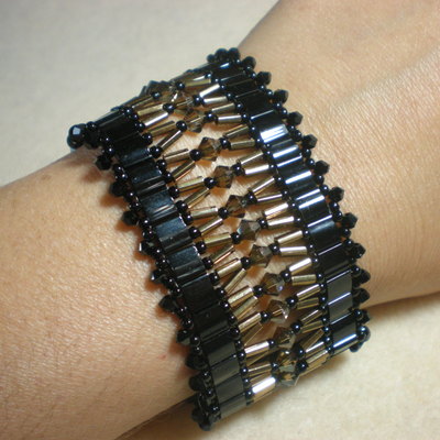 Wide and bold black and bronze crystal bracelet
