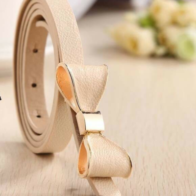 Skinny, bow accented fashion belt