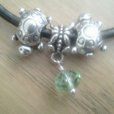 Light green crystal & turtle spacers charm bracelet