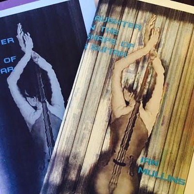  laughter in the shape of a guitar