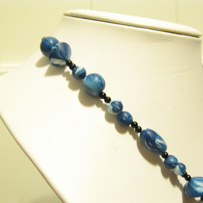 Blue swirl pendant necklace