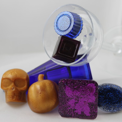 Pumpkins, skulls, bottle cap magnets