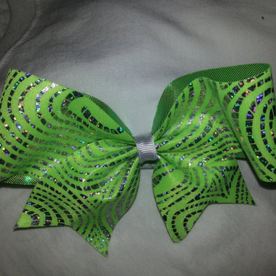 Lime & silver hologram swirls with a white center  cheer bow 3in.