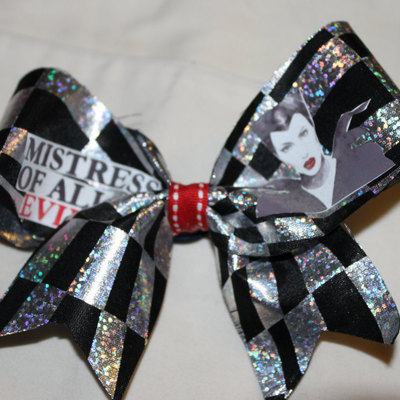 "mistress of all evil";  black & silver lame ribbon with a red center 2 in cheer bow