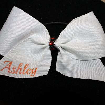 2 in white grosgrain ribbon with orange bling center  (your name here)