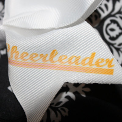 "varsity cheerleaders" 2 in white grosgrain ribbon with yellow center 