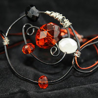 Circle the Orbit Wire Bracelet with Black, Orange & White Swarovski Crystals - Thumbnail 1