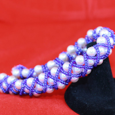 Eternally intertwined beaded bracelet