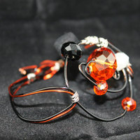 Circle the Orbit Wire Bracelet with Black, Orange & White Swarovski Crystals - Thumbnail 2