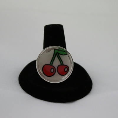 Silver bombshell cherry ring;  red, white, green, black