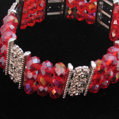 Three strand red stretchy bracelet
