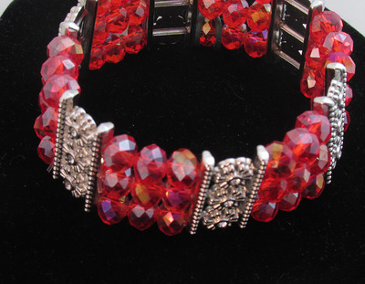Three strand red stretchy bracelet