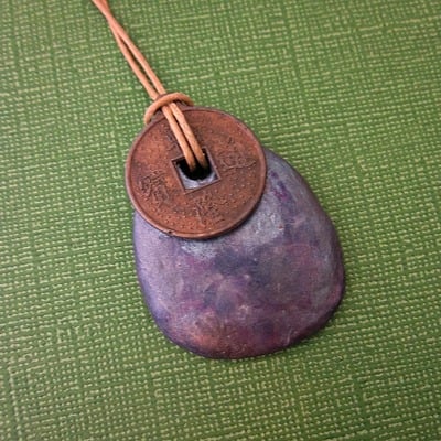 Rustic iridescent purple colored paper mache pendant