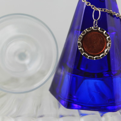 Tiger lily bottlecap on silver chain bracelet 