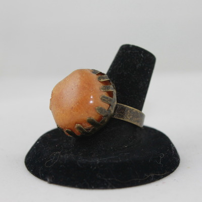 Antique bronze ring in tiger lily resin