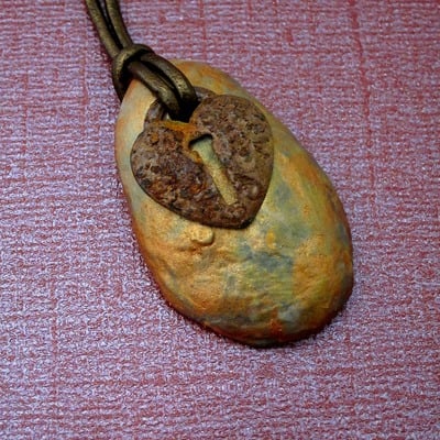 Rustic iridescent gold colored paper mache pendant