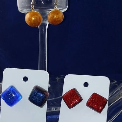 Pillow top earrings in blueberry twinkle resin
